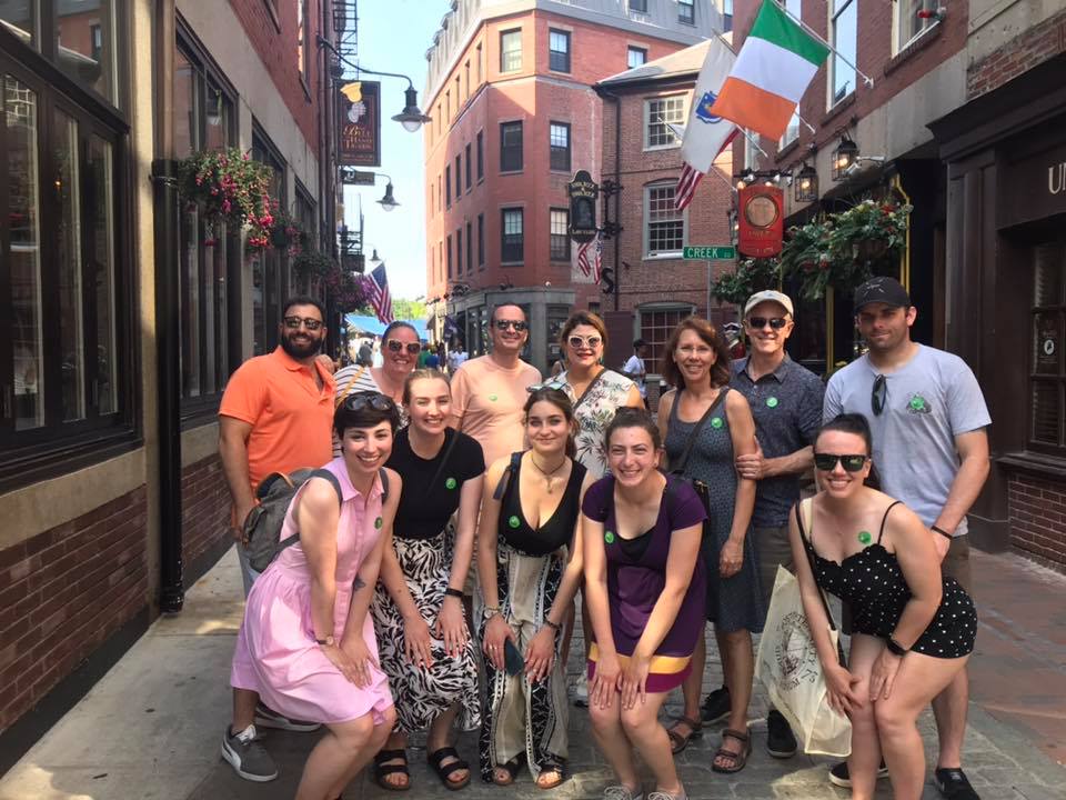 Graduation Pub Crawl – Thumbnail Image a group of people on a sidewalk